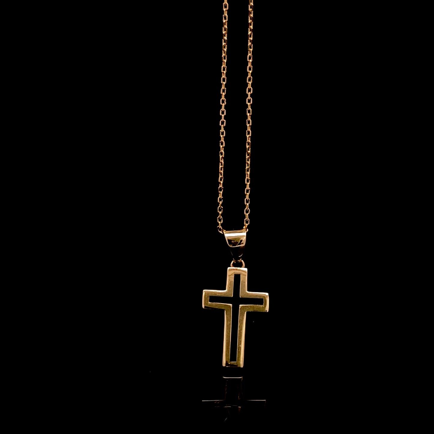 Dije de cruz de bebé en miniatura de oro amarillo de 14 quilates