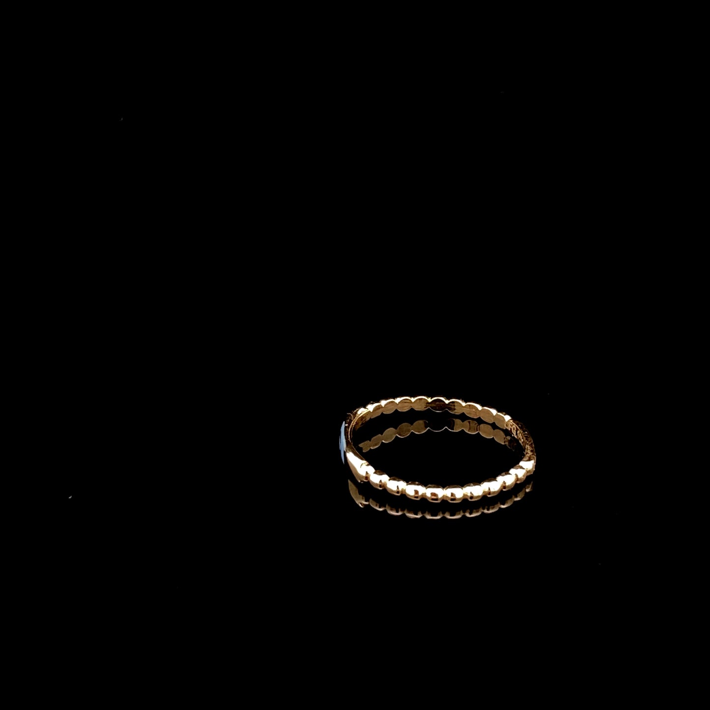 Bague empilable « Mal de Ojo » en or jaune 10 carats