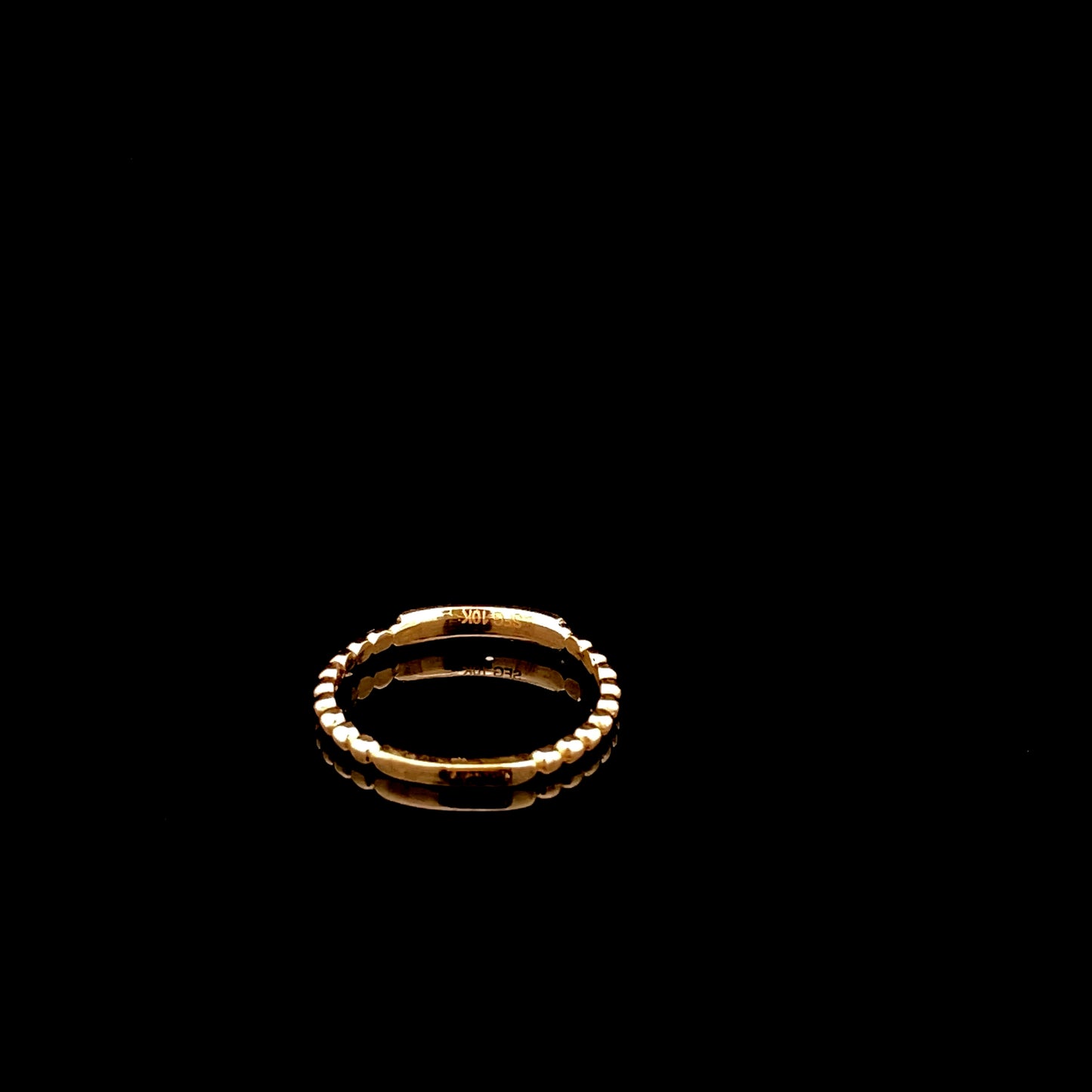 Bague empilable « Mal de Ojo » en or jaune 10 carats