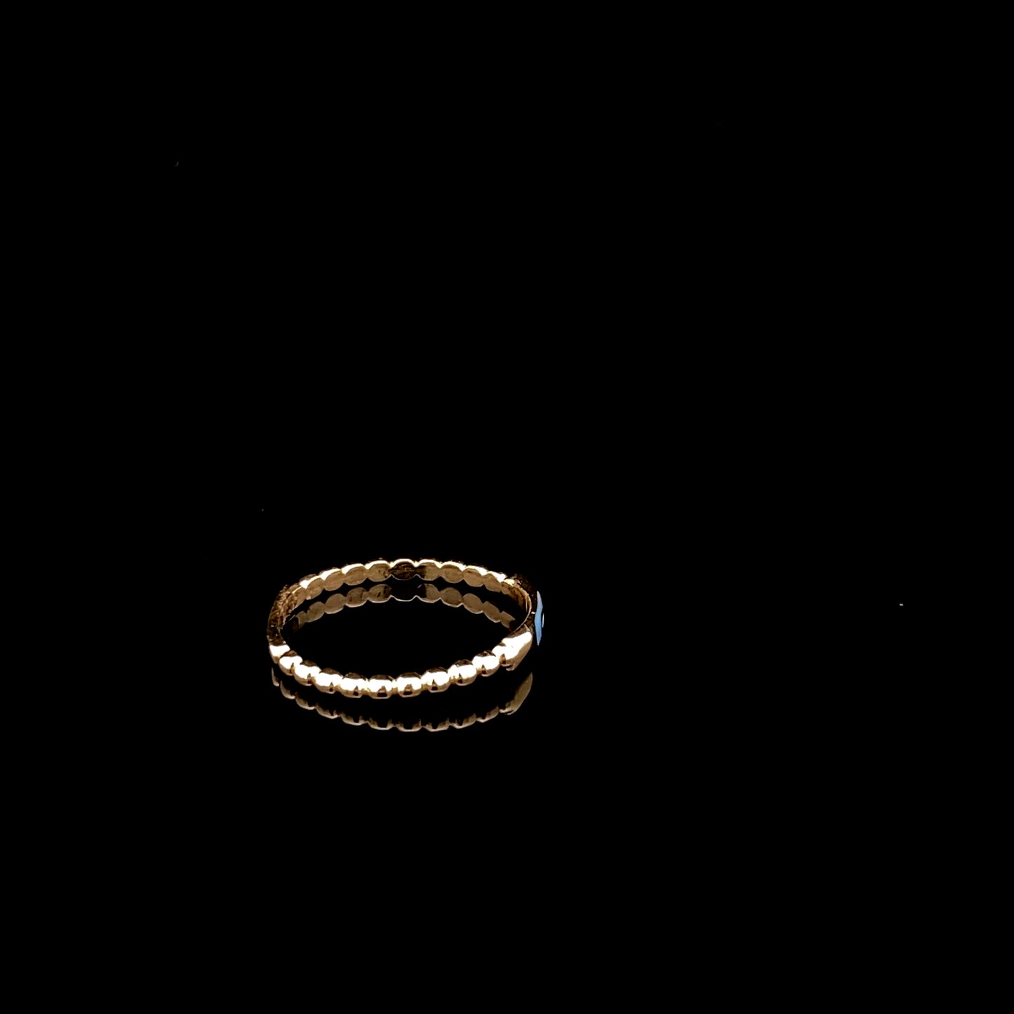 Bague empilable « Mal de Ojo » en or jaune 10 carats