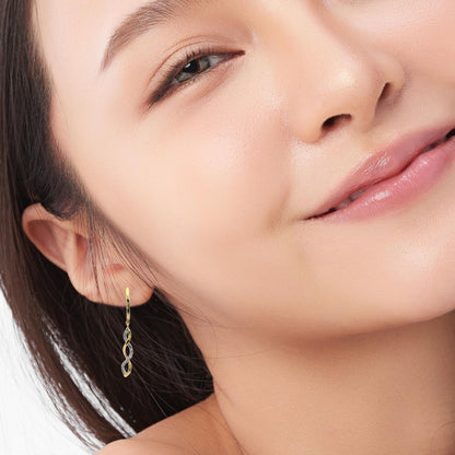 Boucles d'oreilles pendantes torsadées en or jaune 10 carats