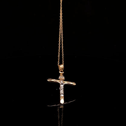 Dije de cruz de bebé en miniatura de oro amarillo de 14 quilates