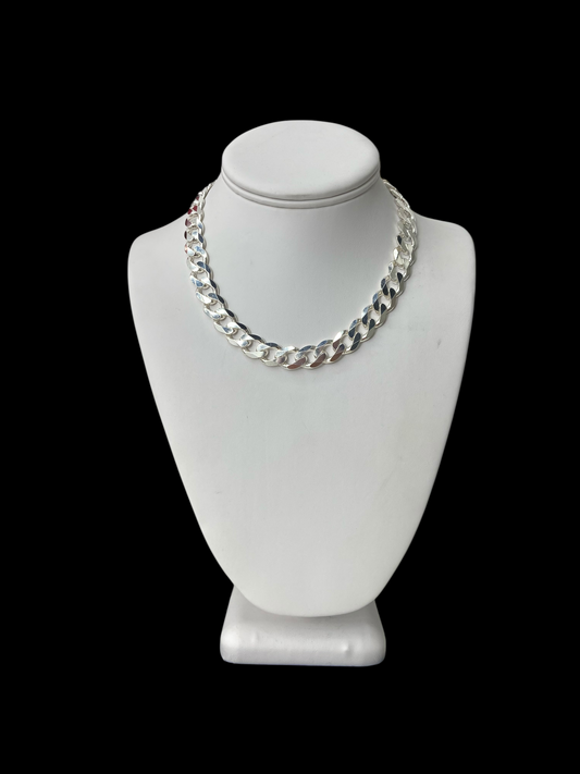 16" 11mm sterling Silver curb chain necklace on a white mannequin bust against a black background
