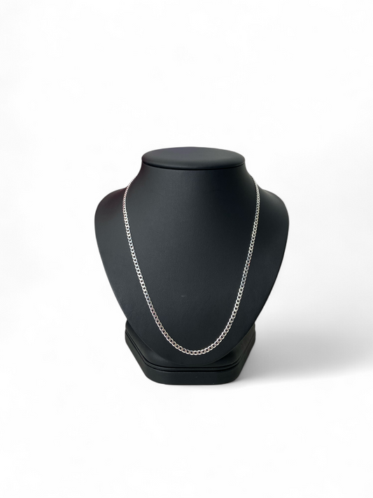 20" 3mm Sterling Silver curb chain necklace on ab lack mannequin set against a white backdrop