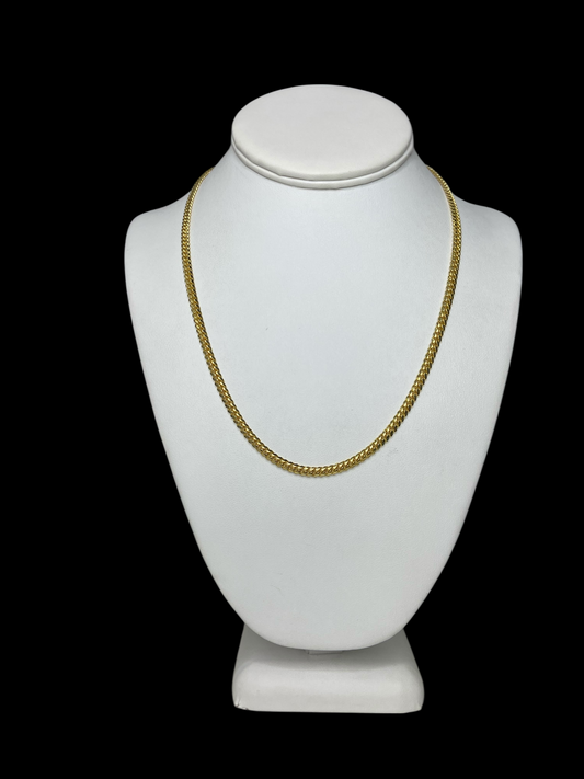 18KT Yellow Gold Cuban Link Chain necklace (20" and 4 mm) on a white mannequin bust against a black background