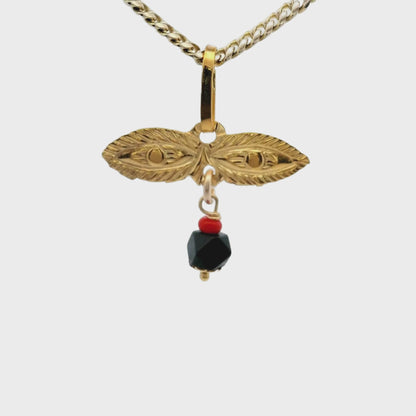 "Ojitos de Santa Lucia" en or jaune 14 carats avec breloque Azabache