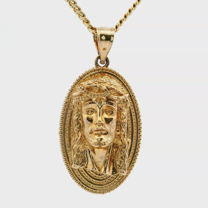 Pendentif tête de Jésus en or jaune 14 carats