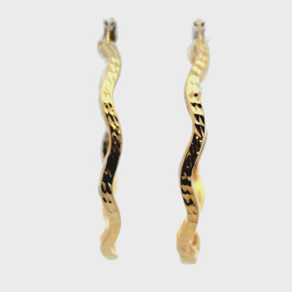 Boucles d'oreilles créoles torsadées de taille moyenne en or jaune 10 carats